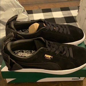 Rare Puma black on black suede bow sneakers